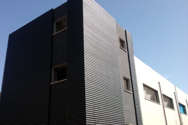 rivestimento-a-doghe-torre-centro-commerciale